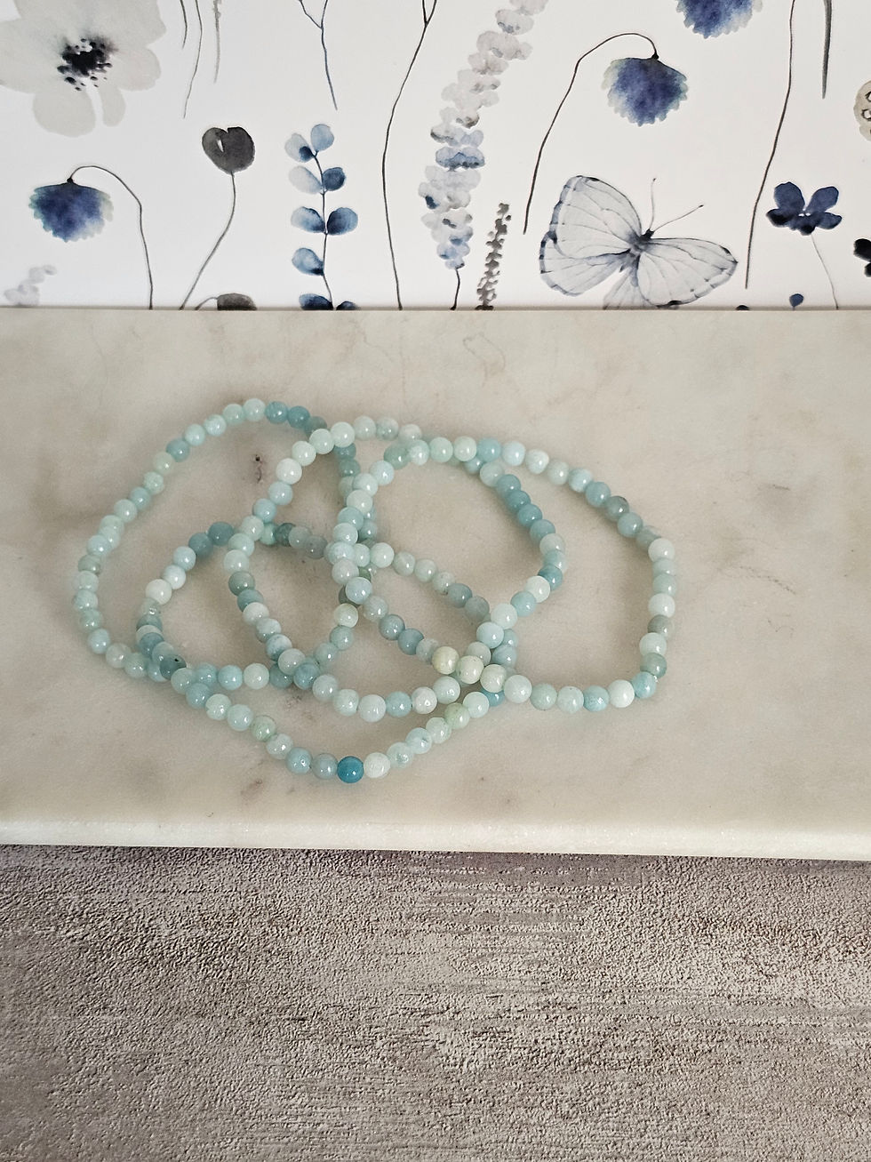 A serene bracelet made with 4mm natural Amazonite (Sky Blue Quartz) beads to support emotional harmony, honest expression, and inner truth.