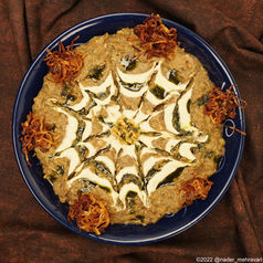 Braised eggplant and kashk (a fermented dairy product) dish