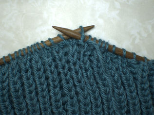 Knitting abbreviation - P-b or P1b