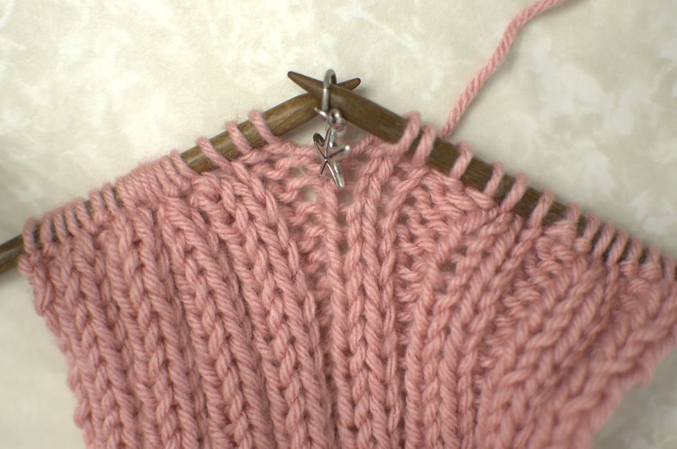 pink swatch on needles with slip marker