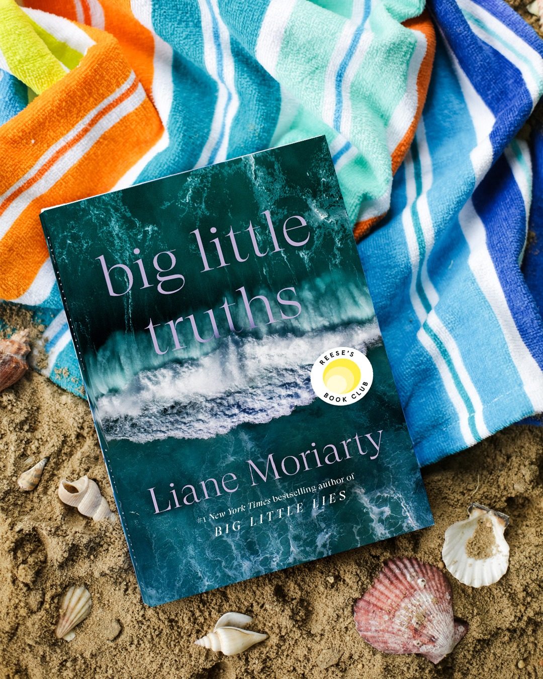 Meta ad for Big Little Truths by Liane Moriarty on a beach towel