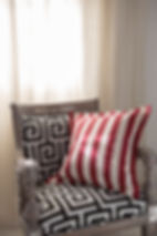 Geometric chair with striped cushion