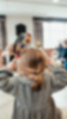 young child in music class