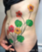 full color flowers torso tattoo by La French Sarah at future ink oakland ca bay area