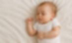 Little baby sleeping on bed. Banner for designs.jpg