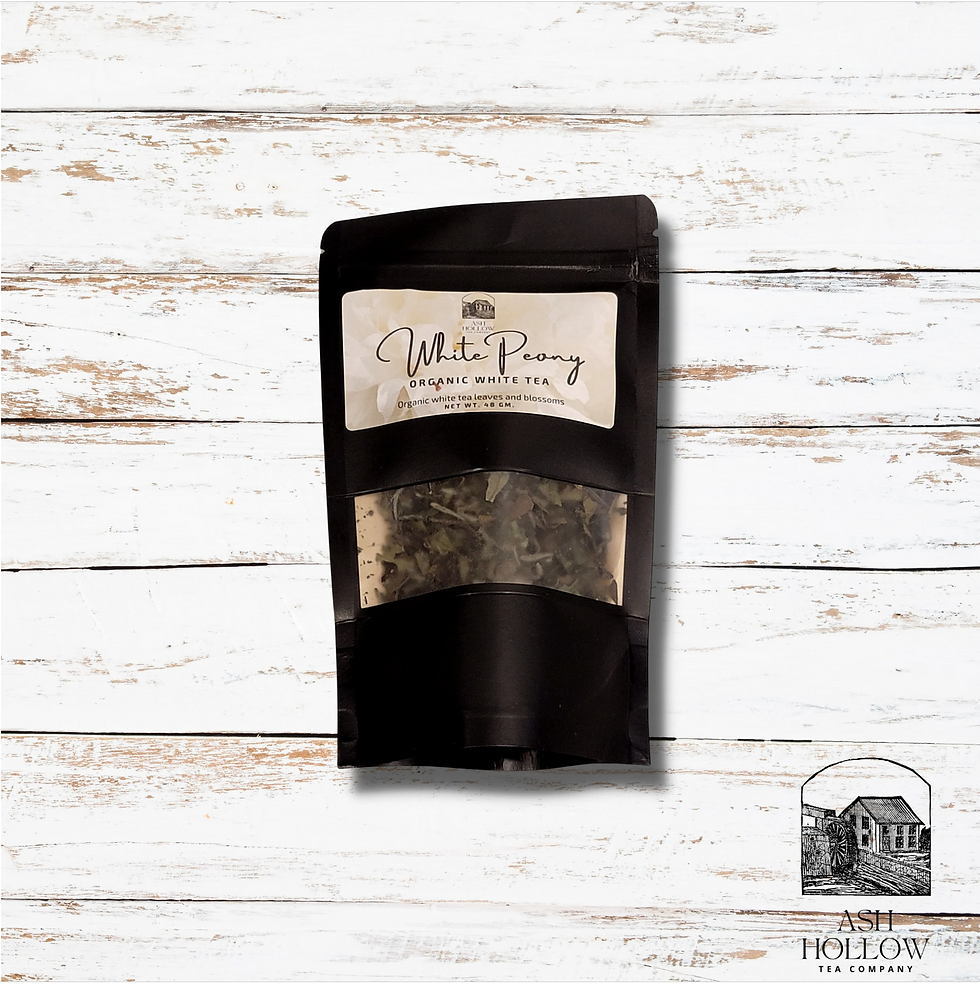 Miniatura: A large black bag of our Organic White peony tea.