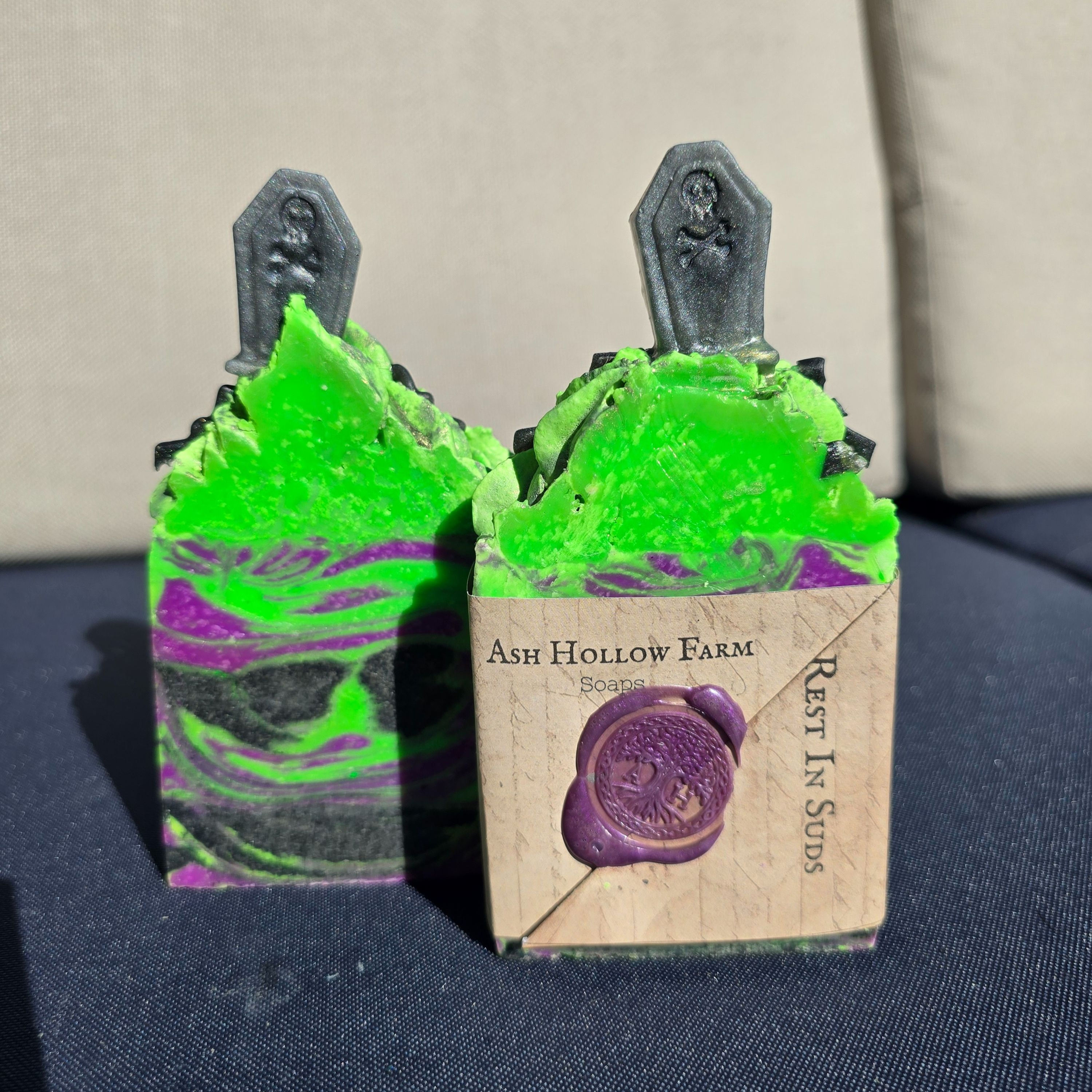 Two bars of our Halloween themed soap called rest in suds.