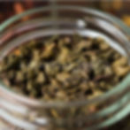 An open jar of Pinhead Gunpowder Green Tea