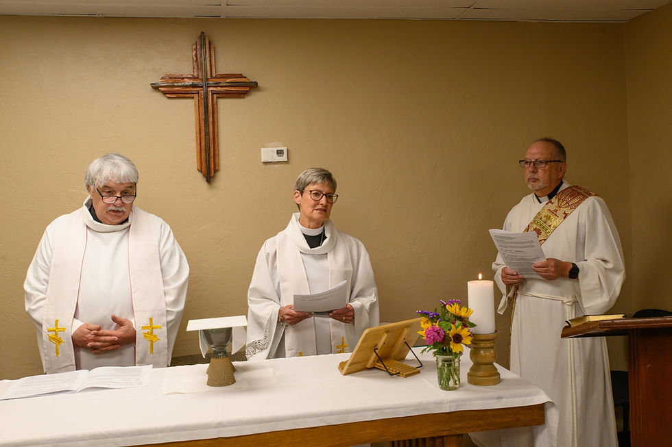 Three clergypersons lead a worship service at a small episcopal church in Harrah, Oklahoma.