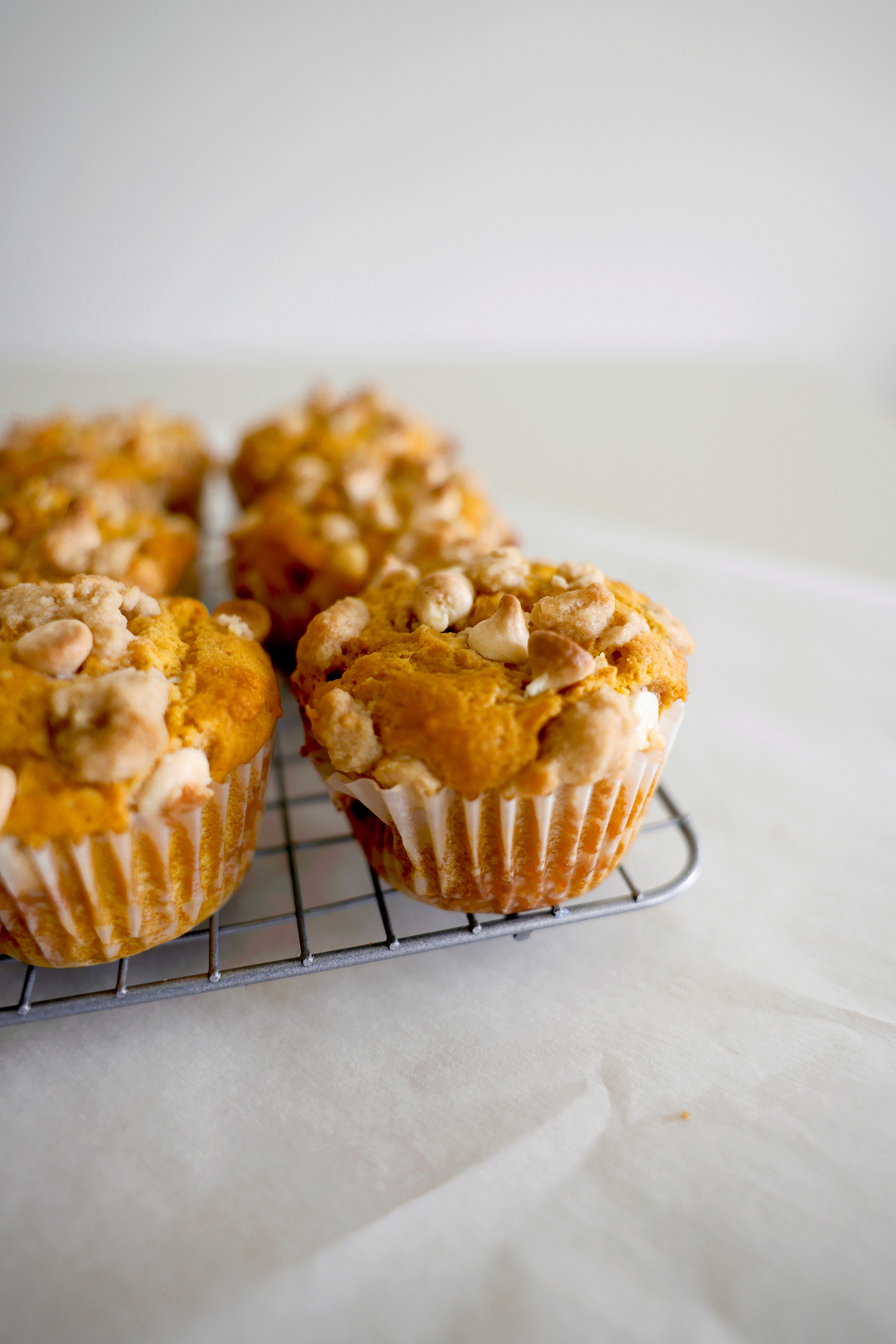 White Chocolate Pumpkin Crumble Muffins