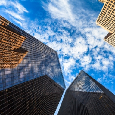 18984225-skyward-view-of-downtown-skyscrapers.jpg