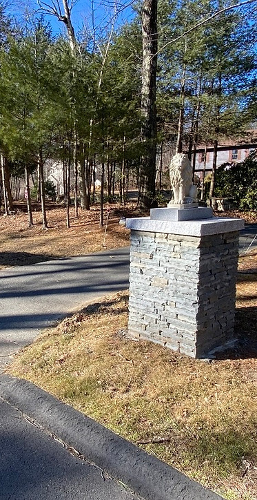Snapped bluestone driveway columns in Avon, CT.