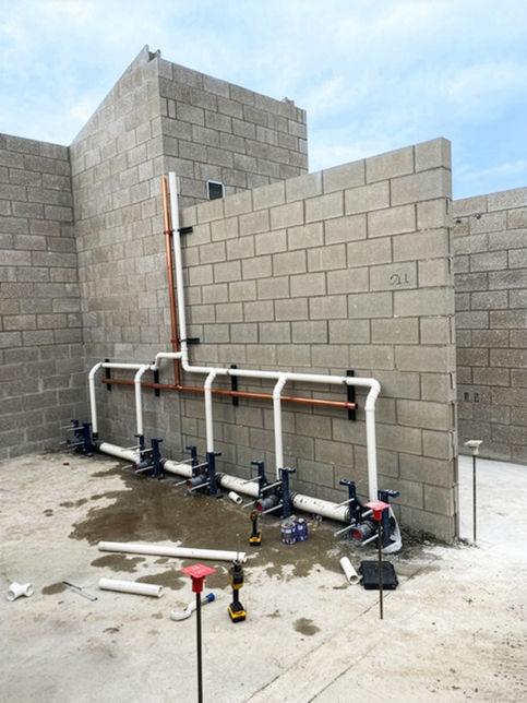 Commercial plumbing rough-in installation by licensed West Michigan contractor