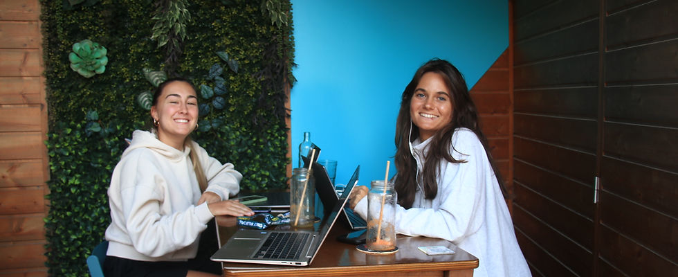 tachers of the language school little talks while they are working on their laptops in a pleasant atmosphere
