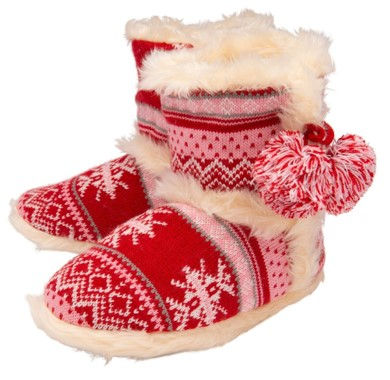 Close-up view of soft sole slippers on wooden floor