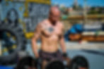 Fit man doing Farmer's Carry