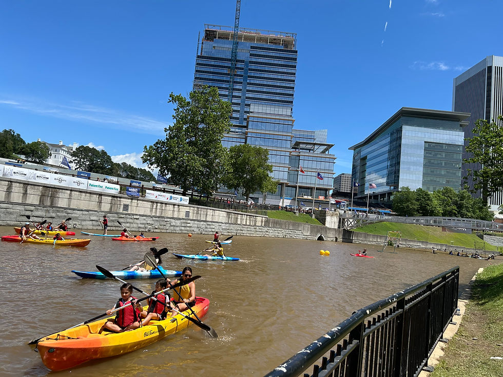 Eye-level view of a kayak gliding on the James River