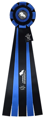 Royal blue and black rosette ribbon with a horse-head center button and long black streamers with silver imprint.