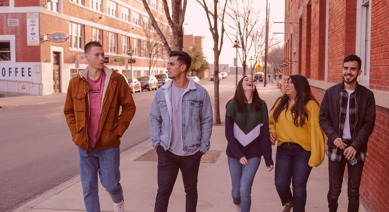 three men and laughing two women walking