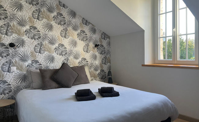 Chambre du gîte Lou Héouguet à Feugarolles