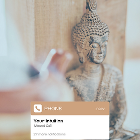 Close-up of serene Buddha statue with overlay message reading “Your Intuition – Missed Call,” representing inner guidance, spiritual awareness, and the journey toward healing and alignment at Inner Flame Academy in Winnipeg.