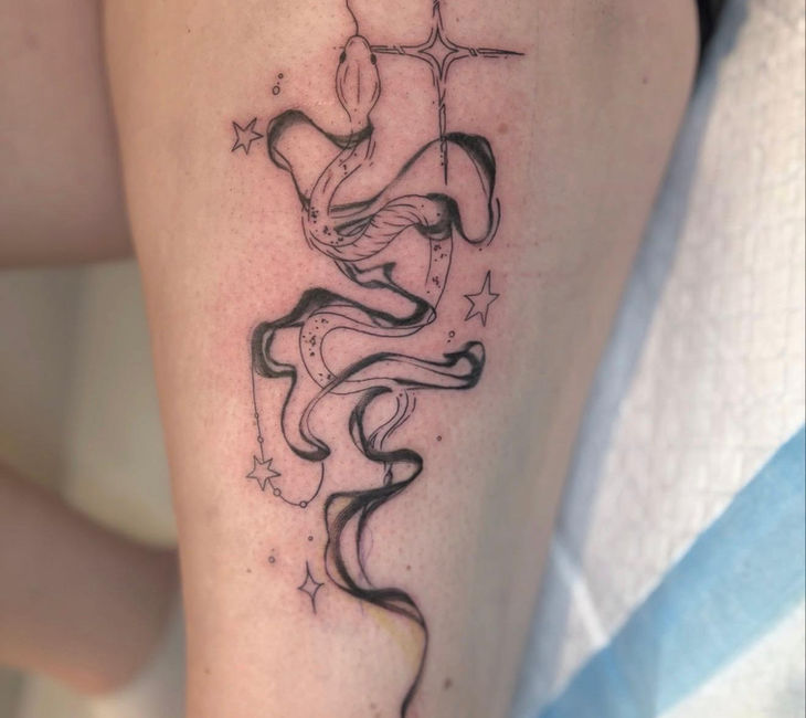 Fine line black and grey smoke tattoo with stars by Draven Toews in Winnipeg.