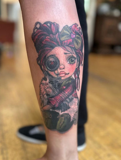 colorful steam punk lady with pigtails and a monocle.  Cover up New School tattoo by Jodie Wentz in Winnipeg
