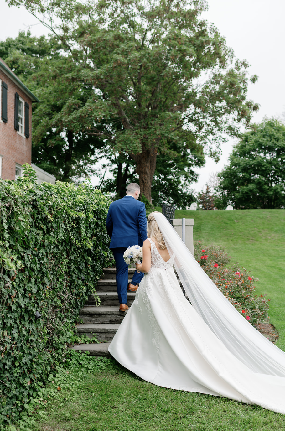 The groom leading the bride away from the ceremony.