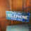 Thumbnail: enamel telephone sign, vintage advertising sign