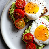 foodiesfeed.com_avocado-toast-with-poached-eggs-and-cherry-tomatoes.jpg
