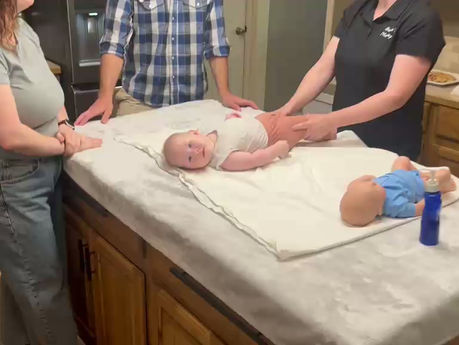 Baby Massage in Action: A Family's Hands-On Learning Session