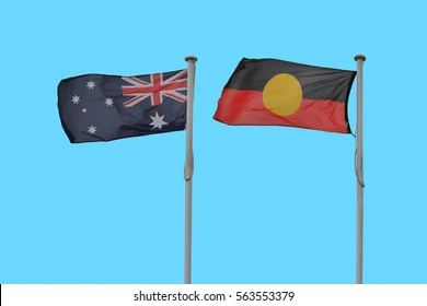 australian-aboriginal-flag-against-blue-260nw-563553379.webp