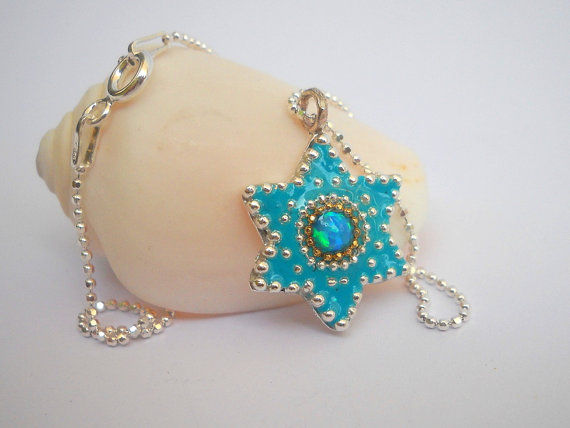 תמונה ממוזערת: Blue star silver pendant inlaid with an Opal