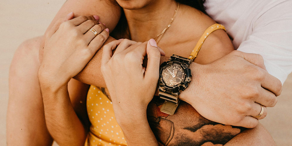 brown couple cuddling - showing intimacy