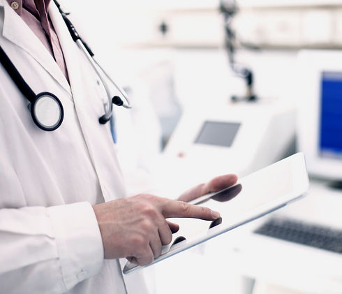 Doctor Using Digital Tablet_edited_edited.jpg