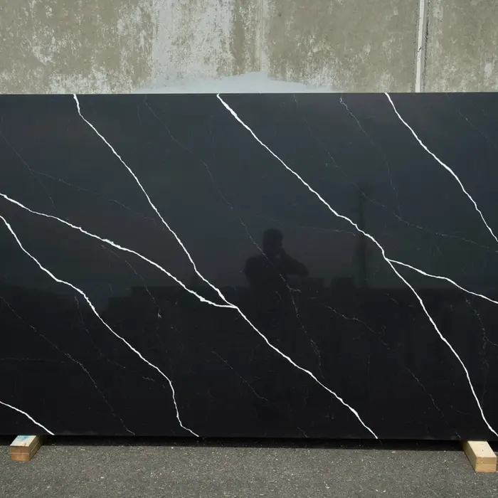 Black countertop with white vein lines, perfect for kitchen design projects