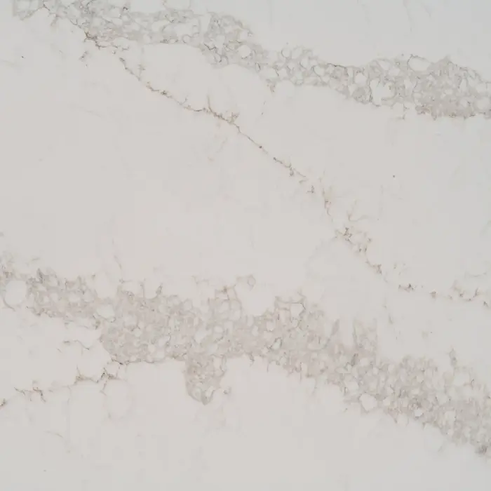 White and gray marble countertop with intricate veins and patterns visible.