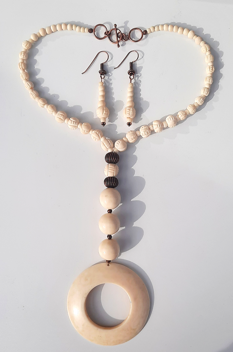 Thumbnail: 16" carved bone and copper beaded necklace with 6" dangling pendant; copper toggle clasp - 2½" bone and copper beaded earring