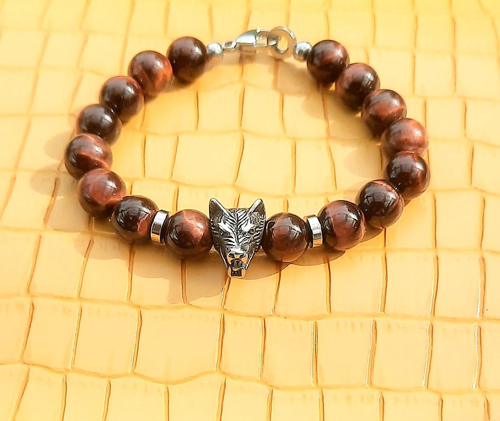 Red Tiger Eye gemstone and stainless steel beaded bracelet; stainless steel wolf head bead and lobster clasp.