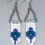 Thumbnail: 3½" lightweight dangling seed bead earrings (white, purple and green) with stainless steel chain links and earring hooks.