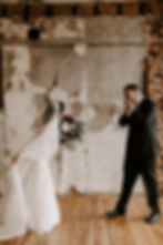 A bride wearing a Juliet Cap wedding veil.