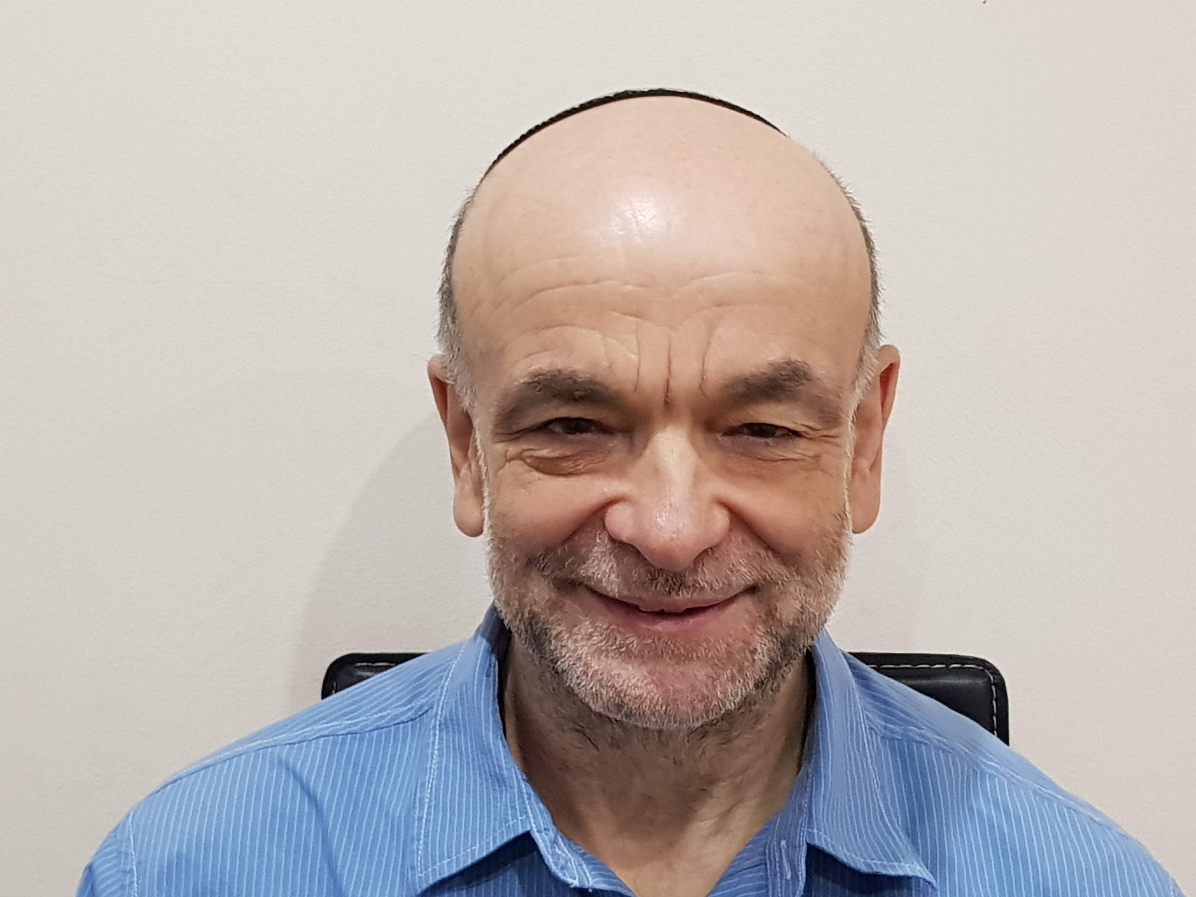Prof Malcolm Granat