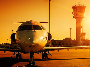 plane-airport-sunset.jpg