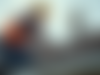 Eye-level view of a home inspector examining a roof