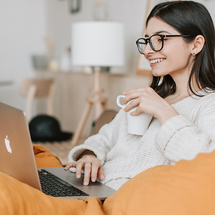Woman with coffee on virtual therapy call