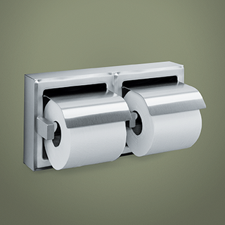 Toilet paper on a stainless steel toilet paper dispenser