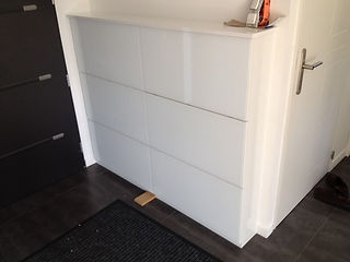 meuble a chaussures sur-mesure placé dans l'entrée