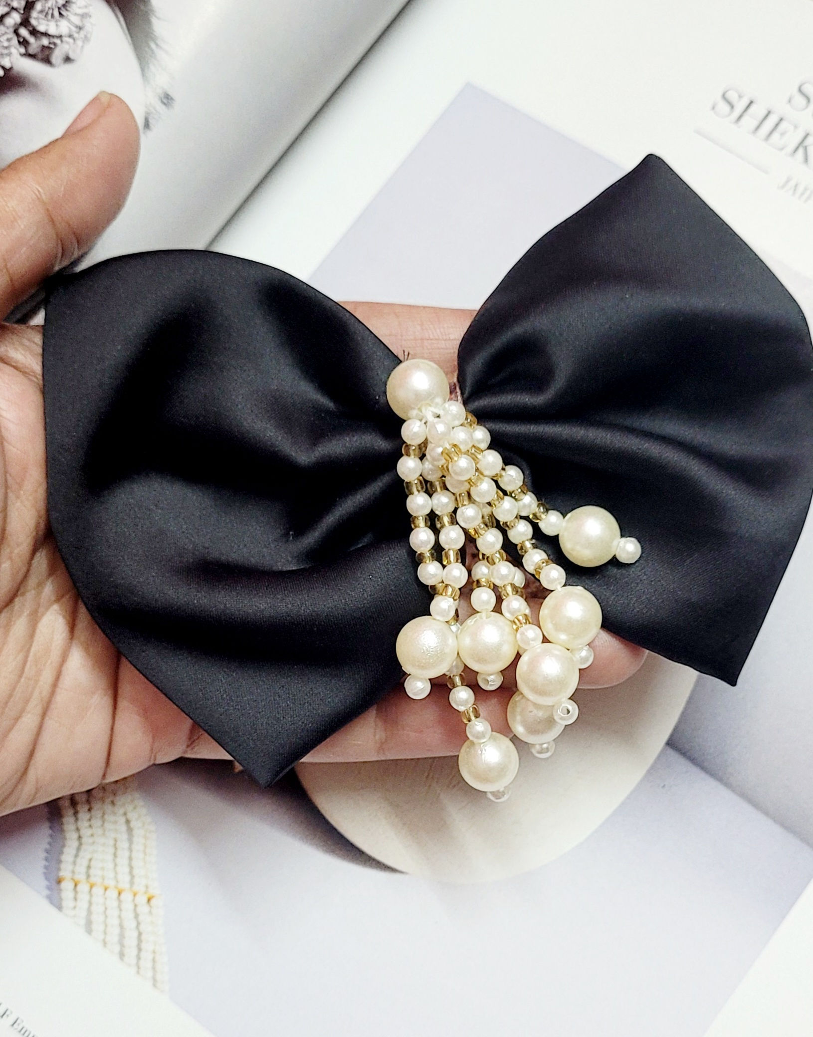 Black Bow With Pearl Tassel