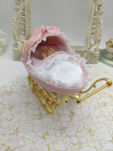 Pink baby pram Eggstravaganza
