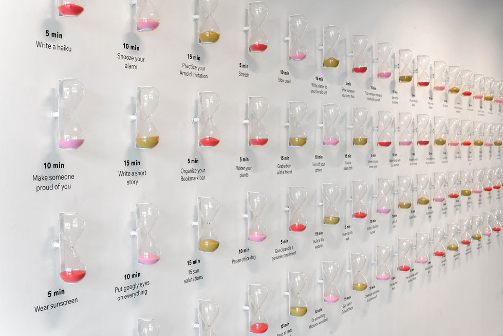 design Wall features an interactive wall with hourglasses for different minutes - hourglass - doron zin _ עיצוב משרדים דורון